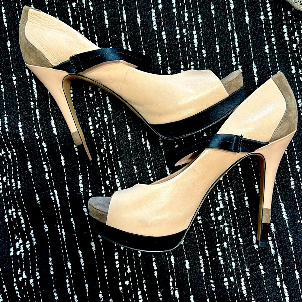 Jessica Simpson heel open toe, different fabrics used, gently worn, size 10